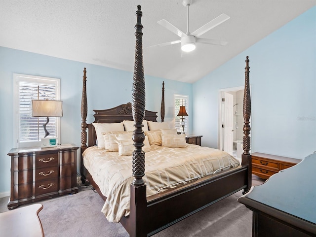bedroom featuring light carpet, a textured ceiling, lofted ceiling, and a ceiling fan