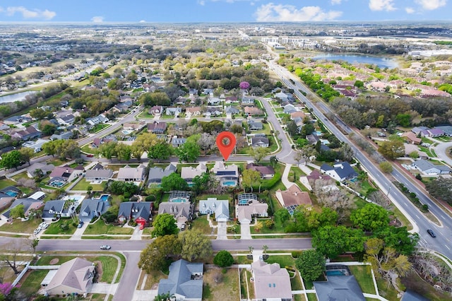 aerial view featuring a water view and a residential view