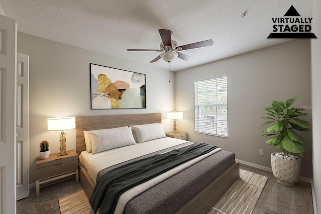 bedroom with a ceiling fan, baseboards, a textured ceiling, and carpet flooring