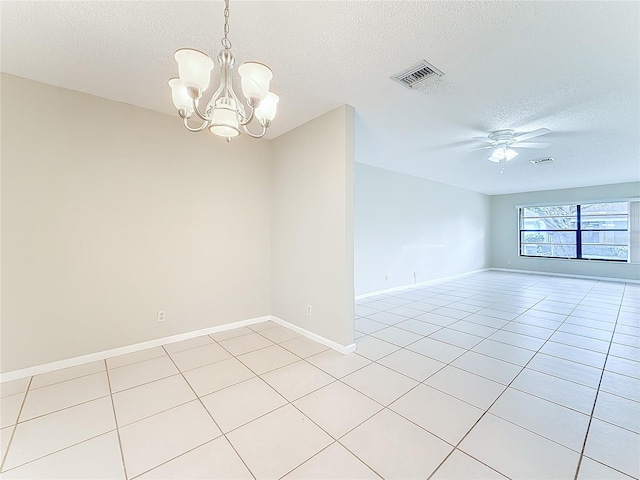 unfurnished room featuring baseboards, visible vents, ceiling fan with notable chandelier, a textured ceiling, and light tile patterned flooring