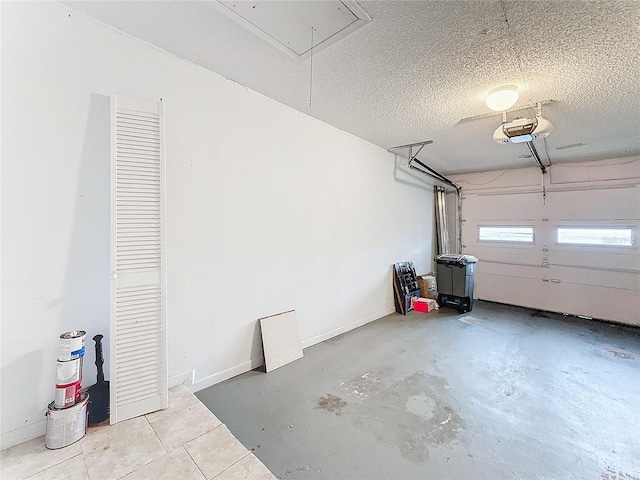 garage featuring baseboards and a garage door opener