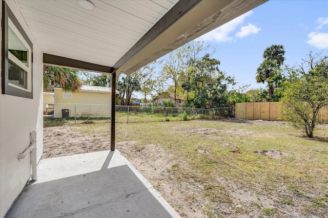 view of yard featuring a patio and a fenced backyard