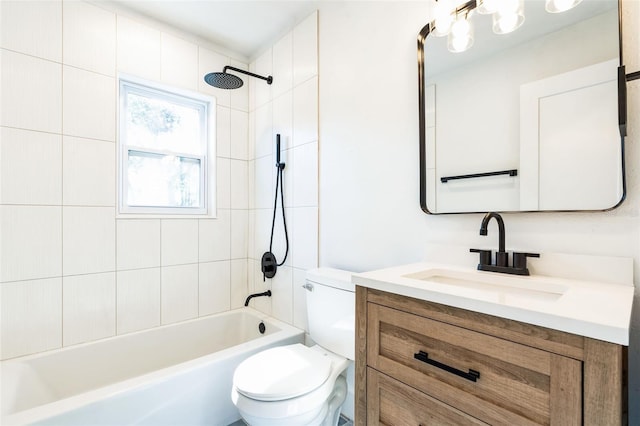 bathroom with toilet,  shower combination, and vanity