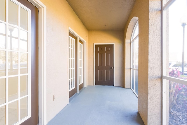 doorway to property with stucco siding