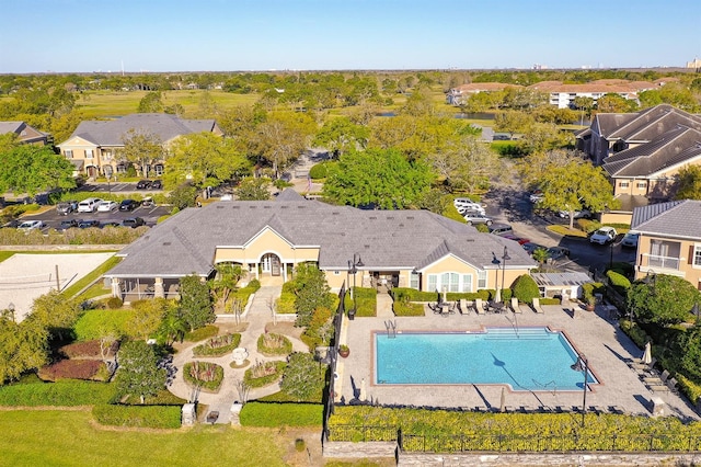 birds eye view of property with a residential view