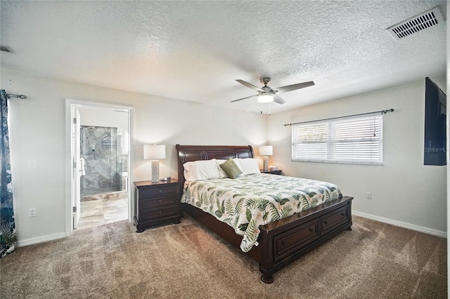 carpeted bedroom with a textured ceiling, ceiling fan, visible vents, and baseboards