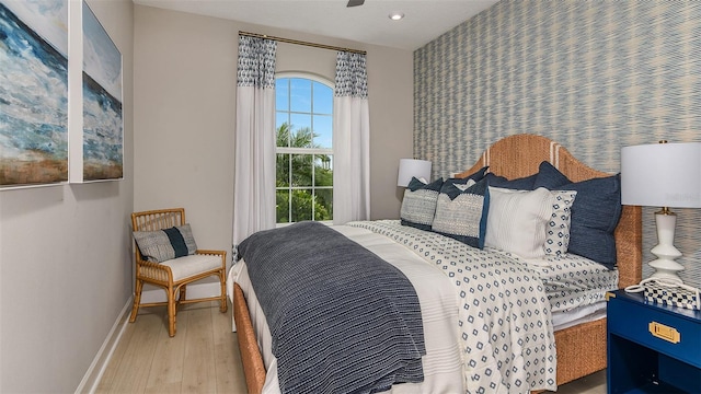 bedroom featuring recessed lighting, baseboards, and wood finished floors