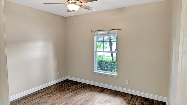 unfurnished room with ceiling fan, baseboards, and wood finished floors