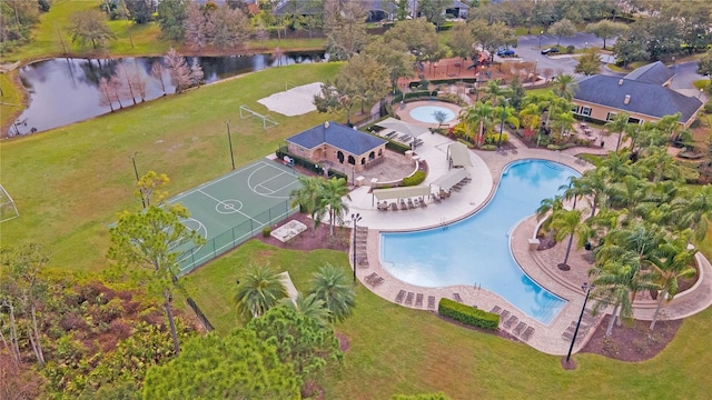 birds eye view of property featuring a water view