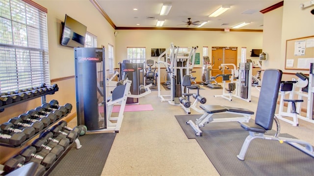 gym with recessed lighting, a ceiling fan, visible vents, and ornamental molding