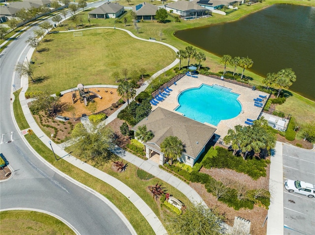 birds eye view of property featuring a residential view and a water view