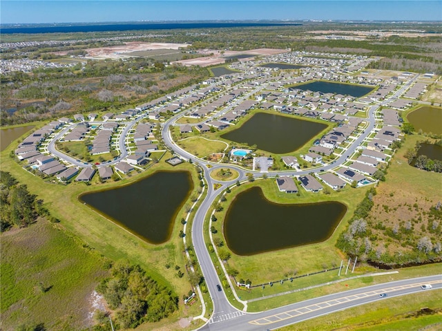 aerial view featuring a residential view and a water view