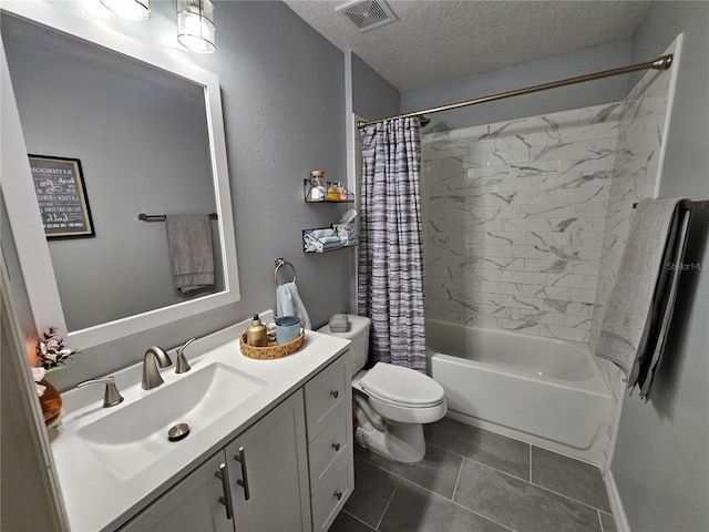 bathroom featuring a textured ceiling, toilet, vanity, visible vents, and shower / bath combination with curtain