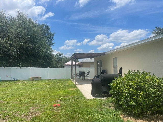2413 Sandridge Cir, Eustis, FL 32726 - view of yard with a patio