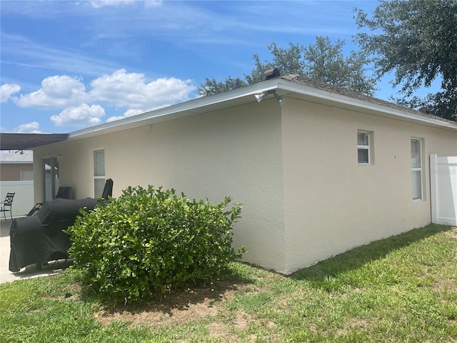 2413 Sandridge Cir, Eustis, FL 32726 - view of home's exterior with stucco siding