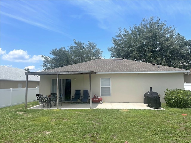 2413 Sandridge Cir, Eustis, FL 32726 - rear view of property with a patio, roof with shingles, and stucco siding