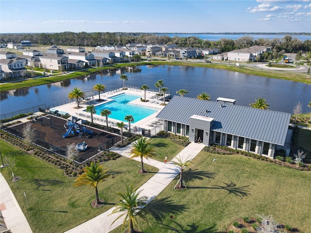 aerial view featuring a water view and a residential view