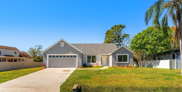 ranch-style house with a garage, concrete driveway, fence, a front yard, and stucco siding