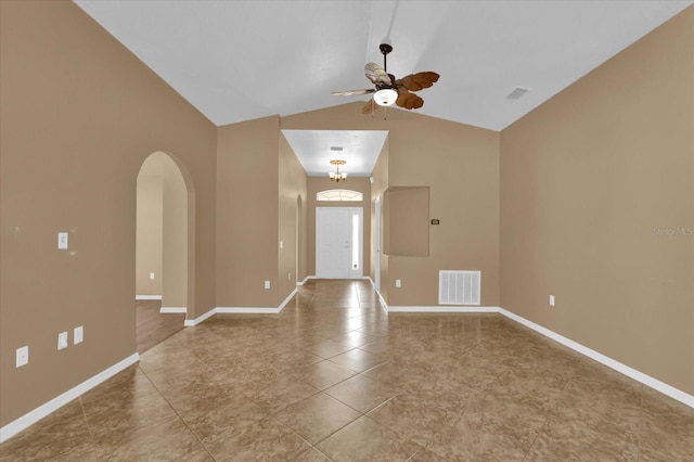 unfurnished room with ceiling fan, arched walkways, visible vents, and baseboards