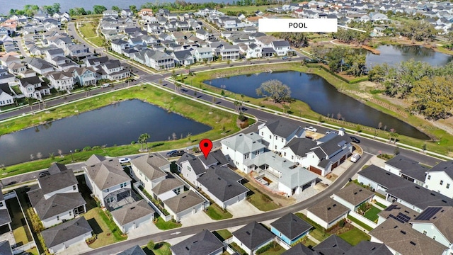 aerial view featuring a residential view and a water view