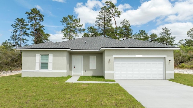 view of front facade featuring an attached garage, a front lawn, and stucco siding