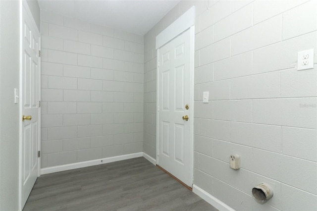 interior space with dark wood-type flooring