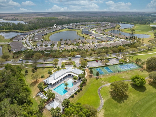 bird's eye view with a residential view and a water view