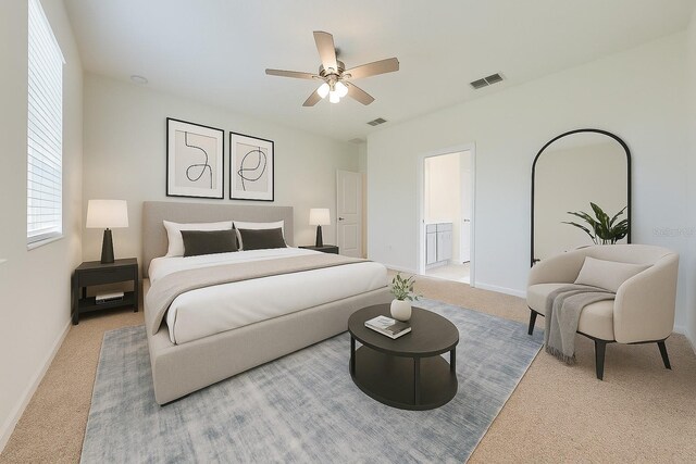 3415 Sagebrush St, Harmony, FL 34773 - carpeted bedroom with a ceiling fan and ensuite bathroom