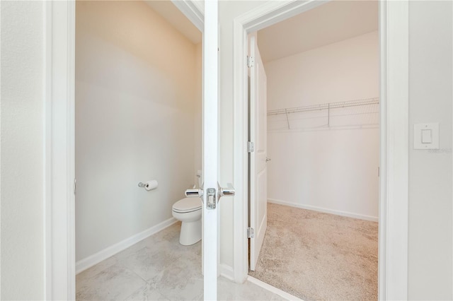 3415 Sagebrush St, Harmony, FL 34773 - bathroom featuring toilet and a walk in closet