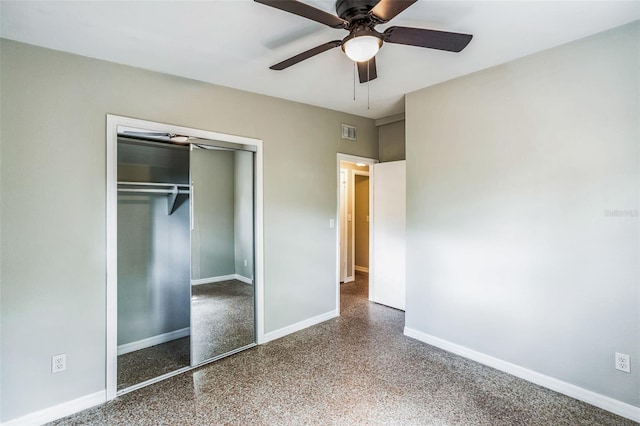 unfurnished bedroom with visible vents, ceiling fan, baseboards, a closet, and speckled floor