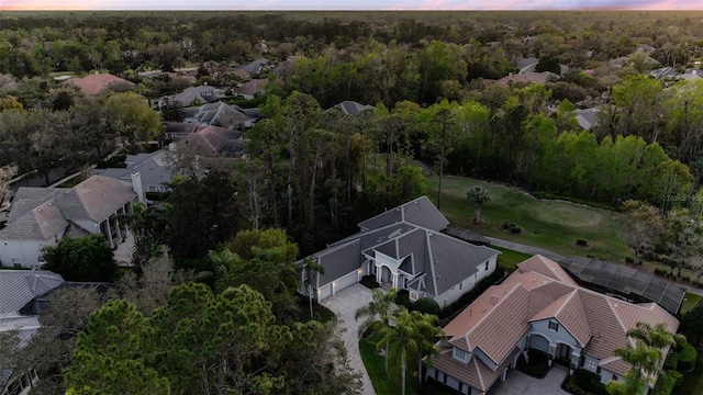 birds eye view of property with a residential view