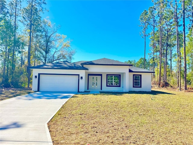 view of front of house with a garage, a front lawn, concrete driveway, and stucco siding