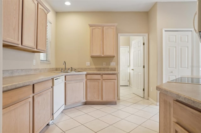 kitchen featuring light tile patterned floors, a sink, light brown cabinetry, light countertops, and dishwasher