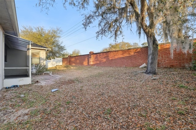 view of yard featuring a fenced backyard