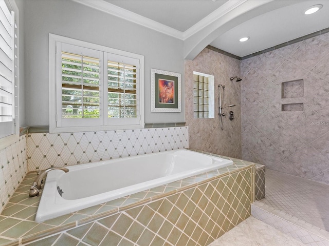 bathroom with ornamental molding, tiled shower, a bath, and recessed lighting