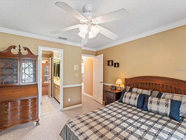 carpeted bedroom featuring visible vents, crown molding, and a textured ceiling