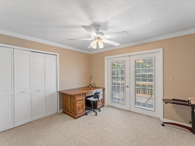 office featuring light carpet, a ceiling fan, crown molding, and french doors