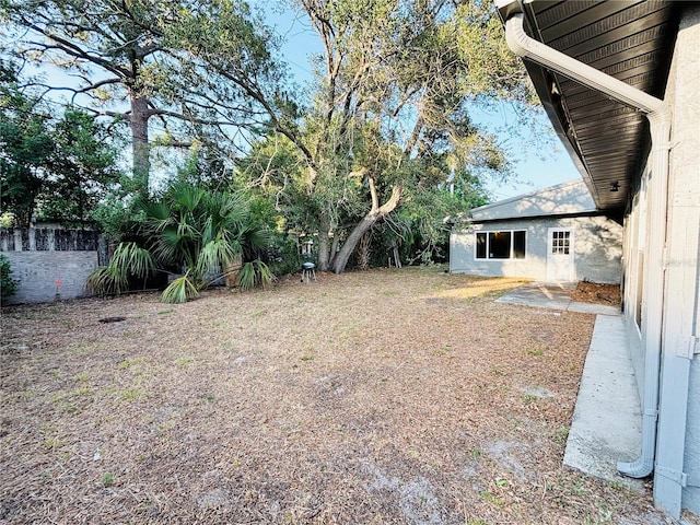 view of yard with fence