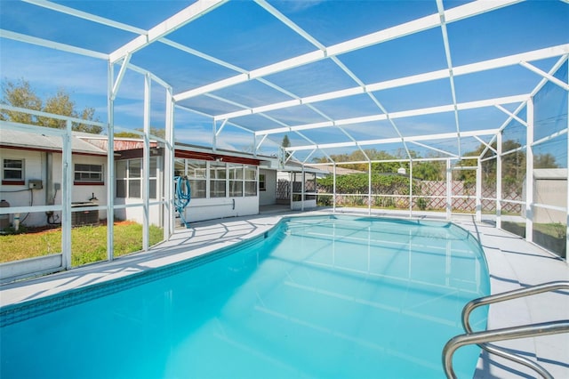 view of pool with a patio, a lanai, and a fenced in pool