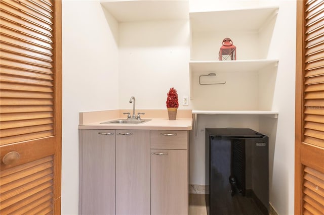 bathroom with wine cooler and vanity