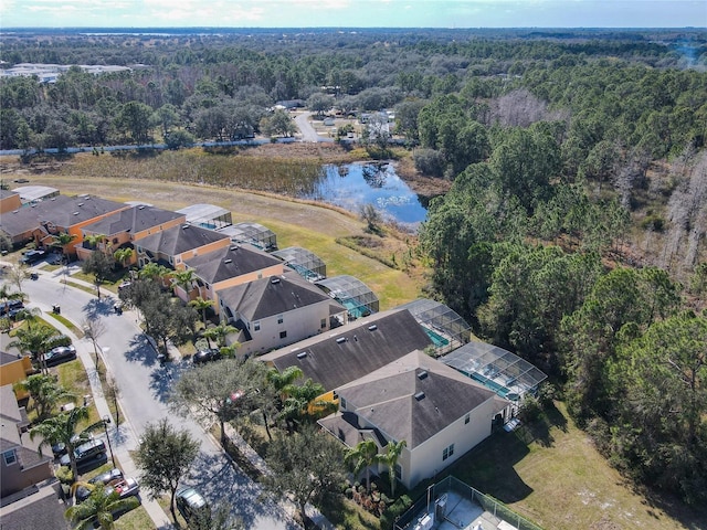 aerial view featuring a residential view, a water view, and a forest view