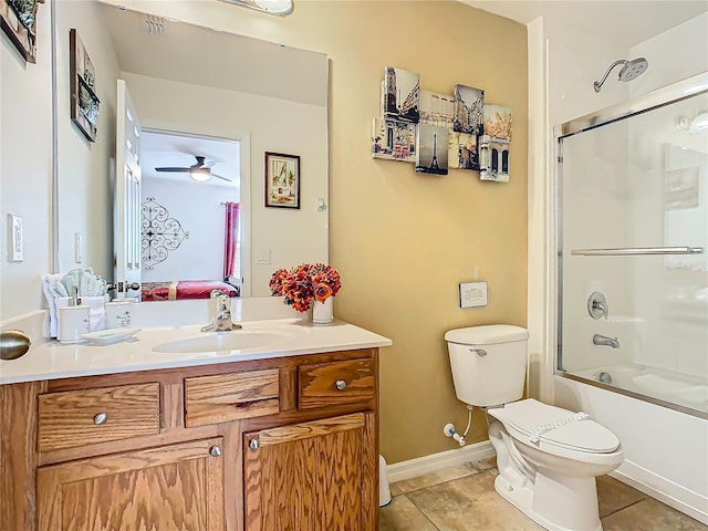 bathroom featuring toilet, ensuite bath, ceiling fan, tile patterned flooring, and vanity