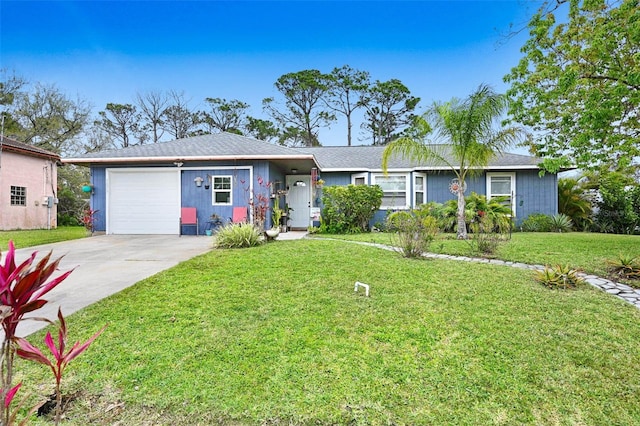 ranch-style home with a garage, a front lawn, and concrete driveway