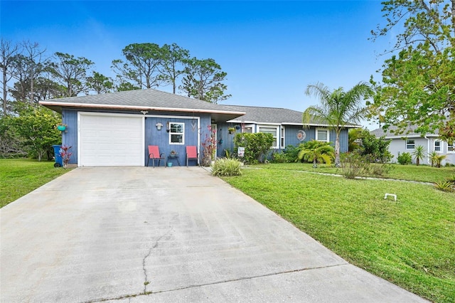 ranch-style home with a front yard, driveway, and an attached garage