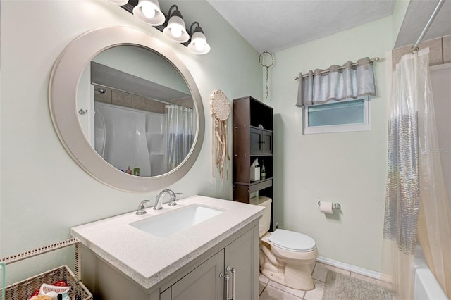 bathroom featuring shower / bath combination with curtain, toilet, vanity, tile patterned flooring, and baseboards