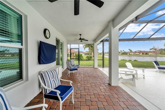 sunroom with a water view