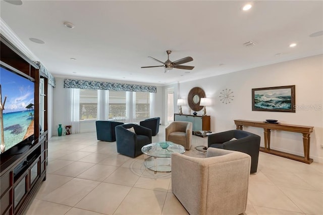 living room featuring ornamental molding, light tile patterned flooring, and visible vents