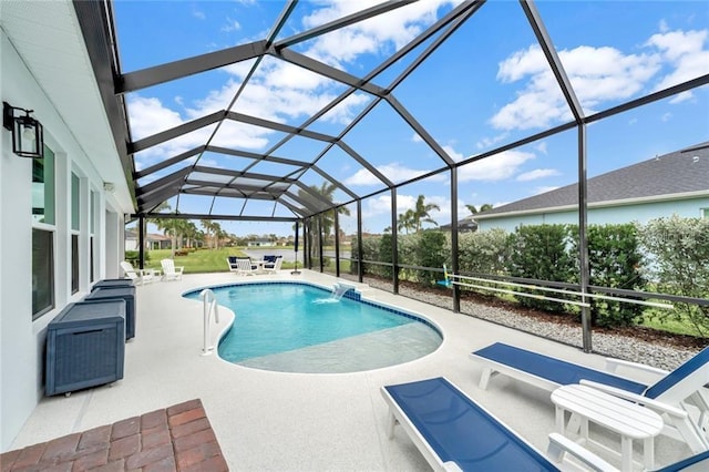 pool with a patio area and glass enclosure