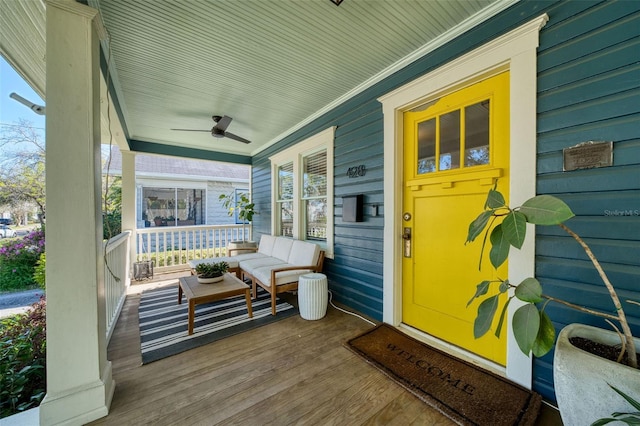 exterior space featuring covered porch and a ceiling fan