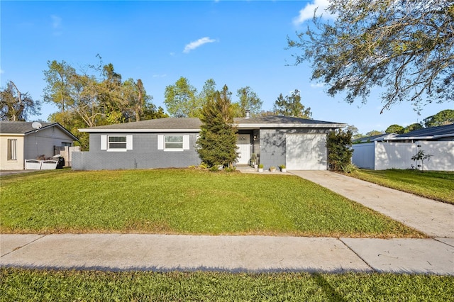 single story home with driveway, a front lawn, an attached garage, and fence